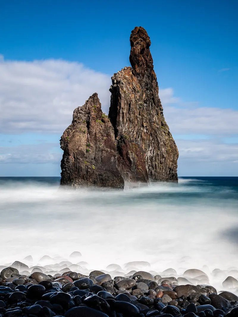 Ribeira da Janela — Dramatic basalt sea stacks at the mouth of a wild river valley.